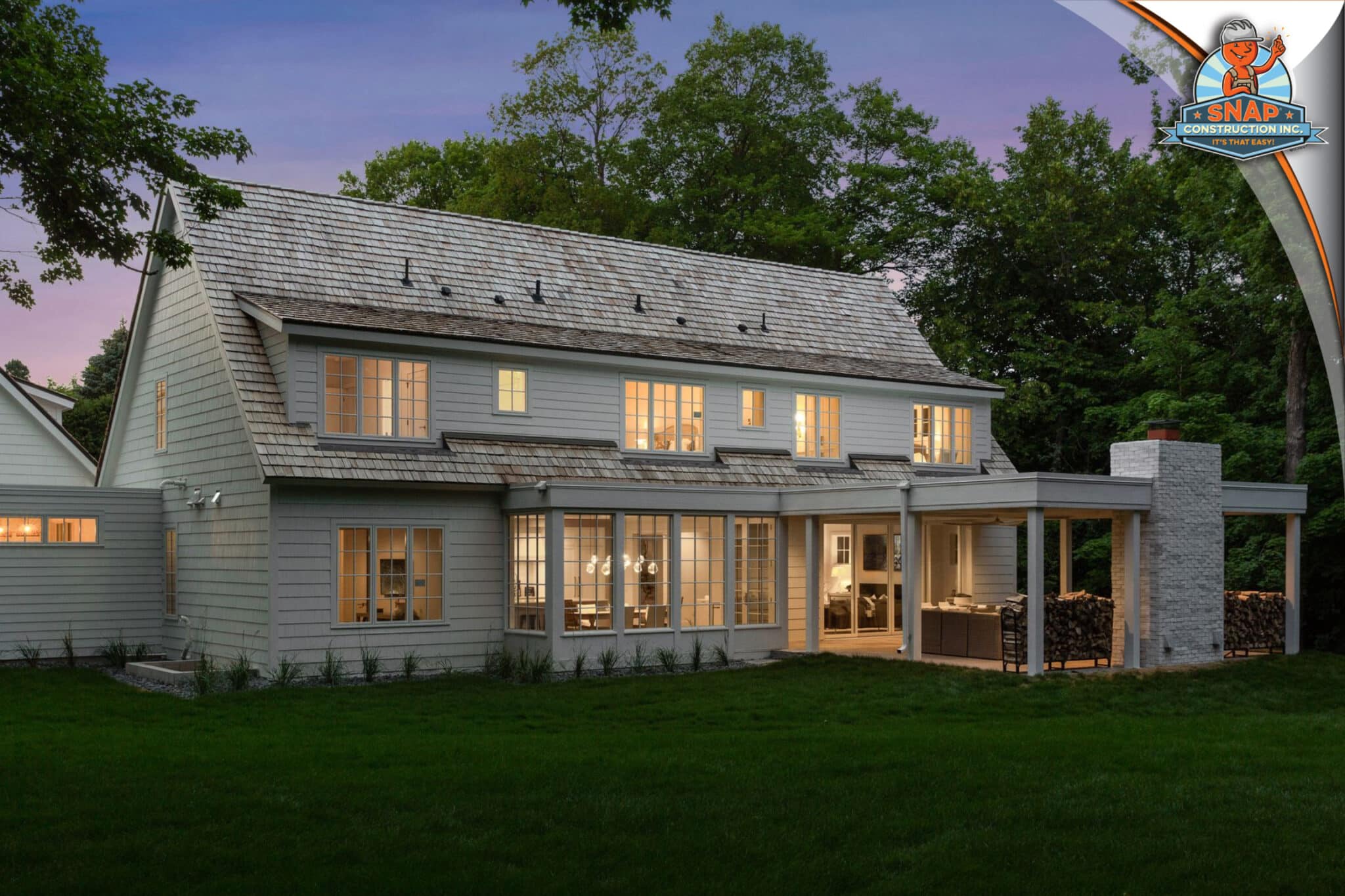 Snap Construction Roof Storm Repair Contractor in Bloomington MN showcasing a gray two-story home with shingle roof and patio at dusk